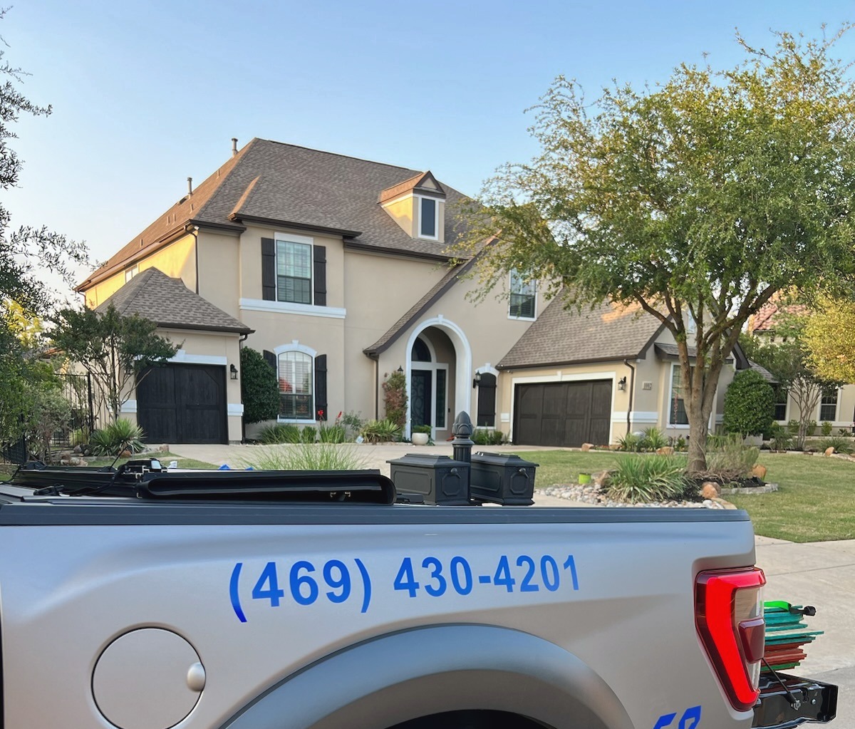 Residential house with truck in foreground