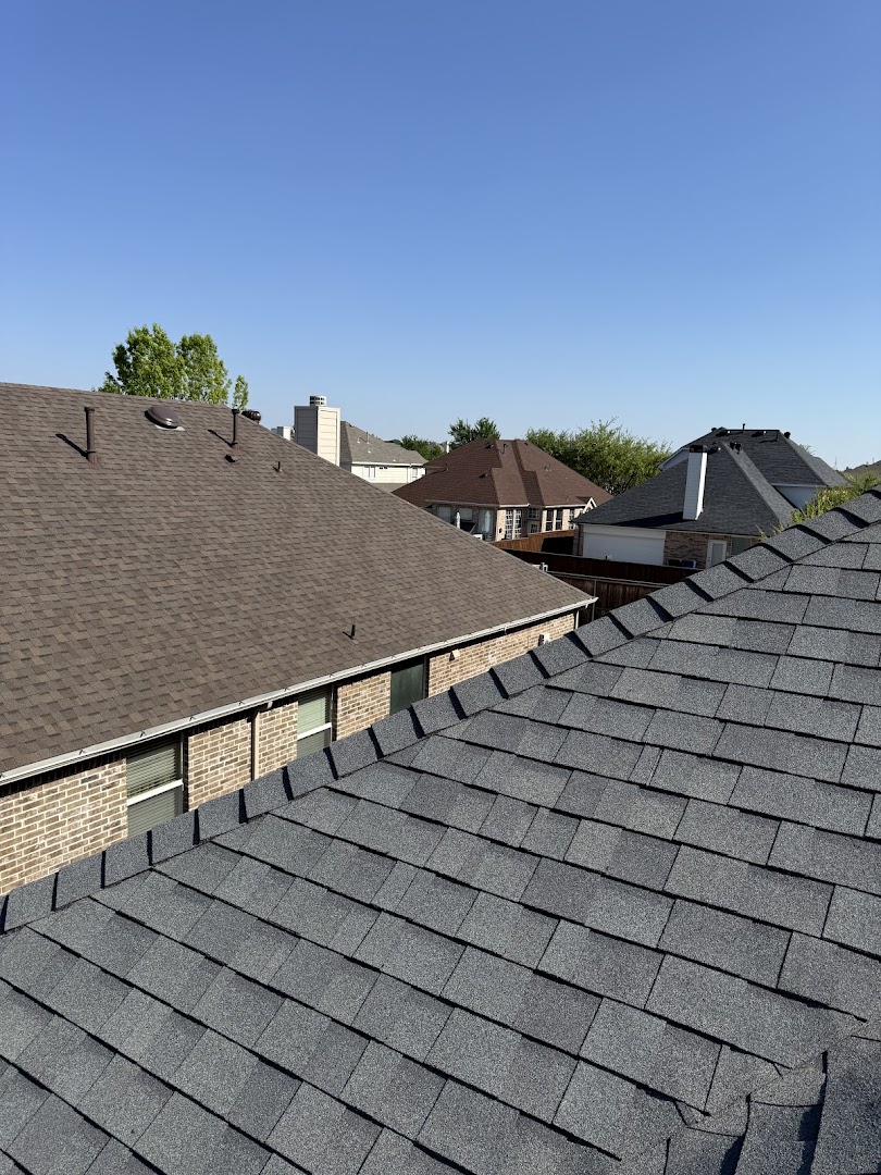 Close-up of newly installed grey shingle roof